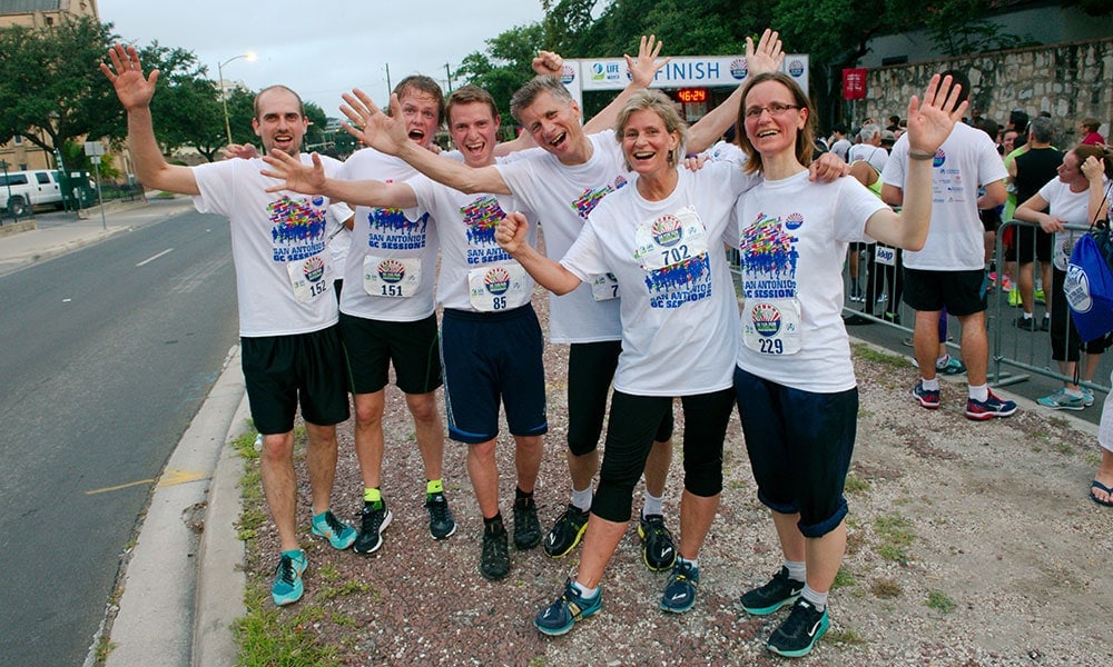 Runners representing the Norwegian Union Conference celebrate after completing the race.  Photo by Tor Tjeransen AR/ANN