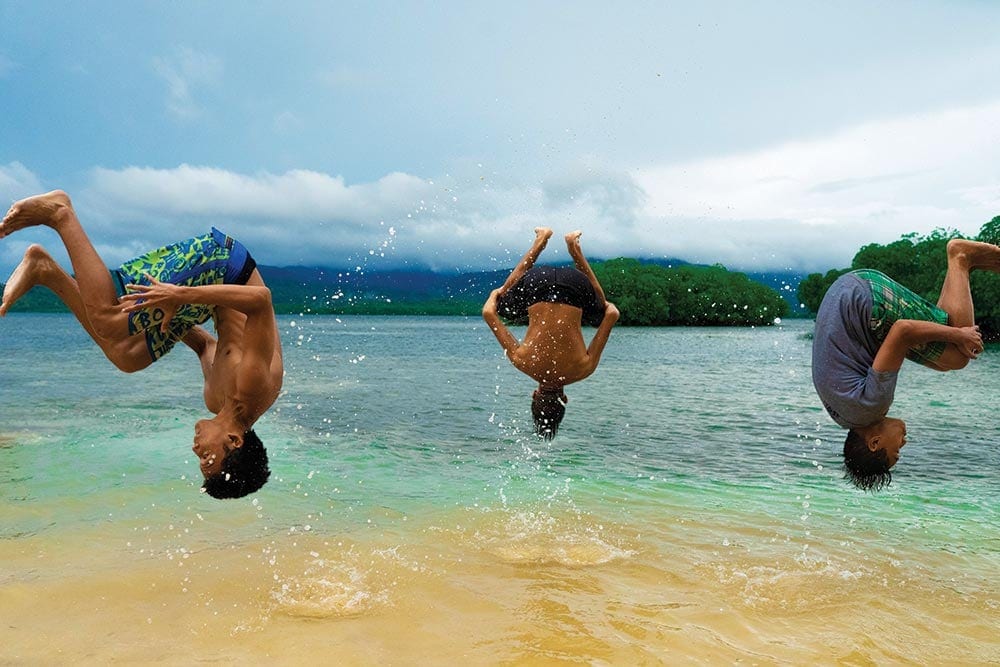 Members of the Pohnpei SDA Acro Fins gymnastics team show one of the skills they learned. [Photo: Adventist Mission]