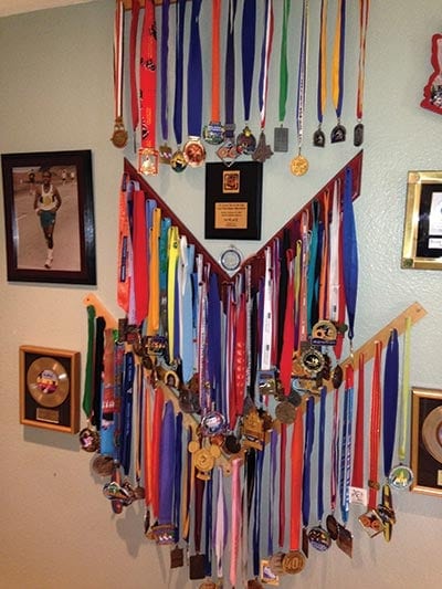 <strong>LOTS OF MEDALS:</strong> The completion of 237 marathons means an extensive collection of medals in the home! 