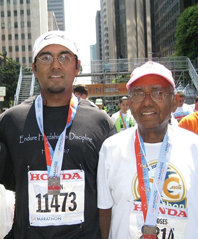<strong>ALL IN THE FAMILY:</strong> Dr. Christian often runs races with his son, Rajan, who is also an accomplished marathoner. 