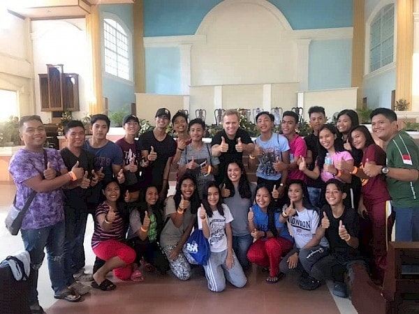 Adventist Church youth director Gary Blanchard (back row, center) smiles during a group picture with some of the Adventist young people attending the SSD Youth Leadership Summit in the Philippines. [Photo: Southern Asia-Pacific Division Youth Department]