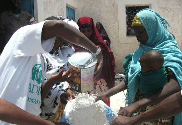 ADRA workers providing urgently needed food to a mother and her children during a drought in Somalia, part of the East-Central Africa Division. “God calls you to shake Africa for Christ!” Wilson said. “Be in connection and communion with Him every day, being revived and reformed in Him every moment of your life.” Photo: ANN