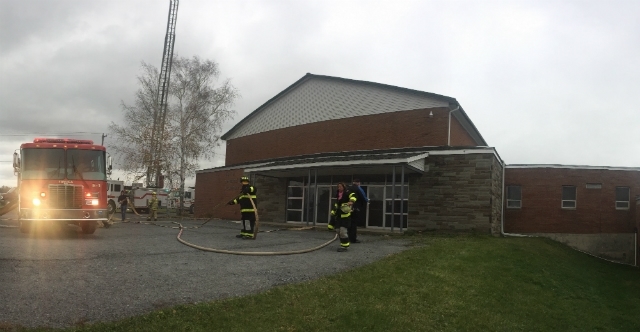 Fire crews outside administration building at Union Springs Academy in central New York State on Sabbath, December 3. (Union Springs Seventh-day Adventist Church photo)