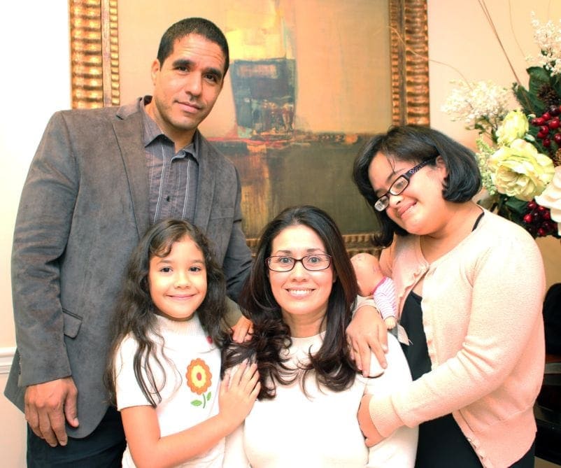 Osvaldo and Yaime Ayala pictured with their daughter, Melanie, left. (Southern Tidings)