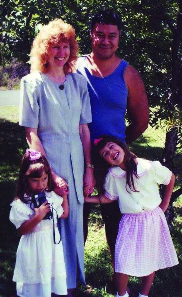Charissa, right, at the age when she enjoyed preaching to the mirror. Also pictured are her parents and younger sister.