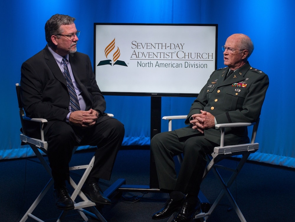 Dan Weber, NAD communication director, interviewing Charles Knapp, retired U.S. Army colonel and chair of the Desmond Doss Council. (Pieter Damsteegt / NAD)