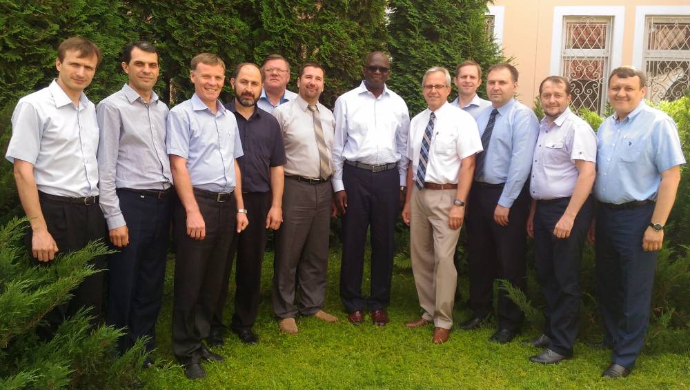 Ganoune Diop, sixth right, posing with Oleg Goncharov, seventh right, and directors of the public affairs and religious liberty departments of various church entities within the Euro-Asia Division during their meetings in Moscow this week. (ESD)