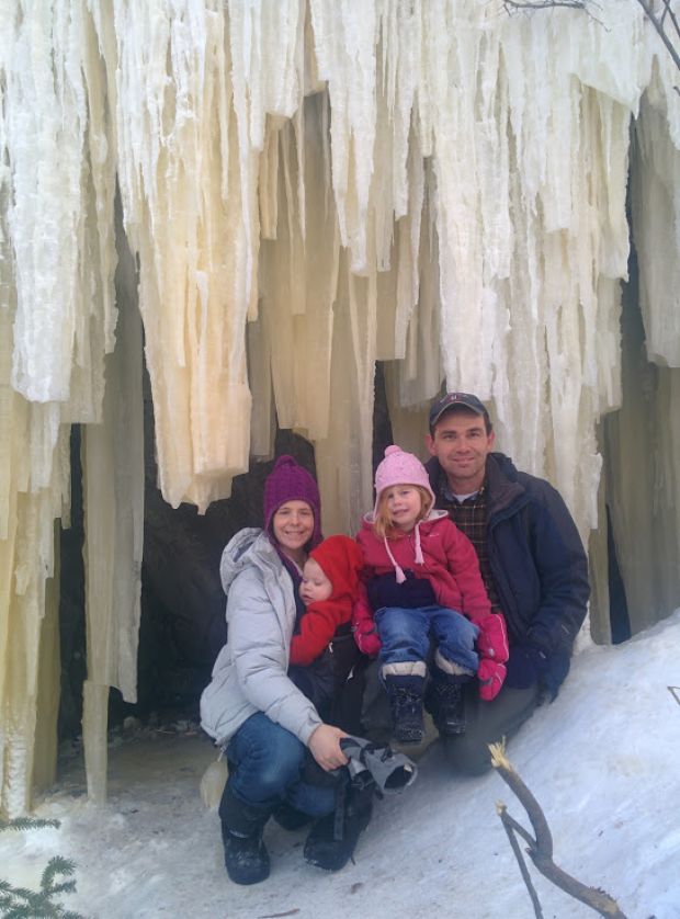 Pastor Jonathan Geraci with his wife, Bethany, and their daughter, Heidi, 3, and son, Eric, 1, visiting the Ice Caves outside Yellowknife, Northwest Territories. (Courtesy of the author)