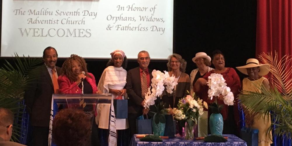 Judith Miranda, second left, welcoming guests to the Malibu Seventh-day Adventist Church in California on April 15, 2017. Child welfare workers, citing privacy concerns, asked that no photos be released of the foster children. [Photo courtesy of Judith Miranda]