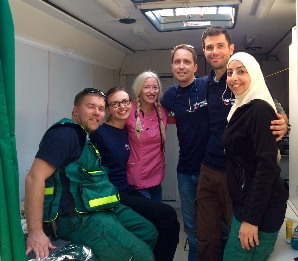 Medical volunteers on the bus: From left, Dr. Carl Tosterud from Sweden; Adventist medical student Laura Lacatushu; Dr. Alison Thompson, an international doctor living in Haiti; Dr. Michael-John Von Hörsten; Dr. Tobias Göbel, and Dr. Israa Abdali from Sweden. The Adventists welcome other volunteer doctors on the bus.
