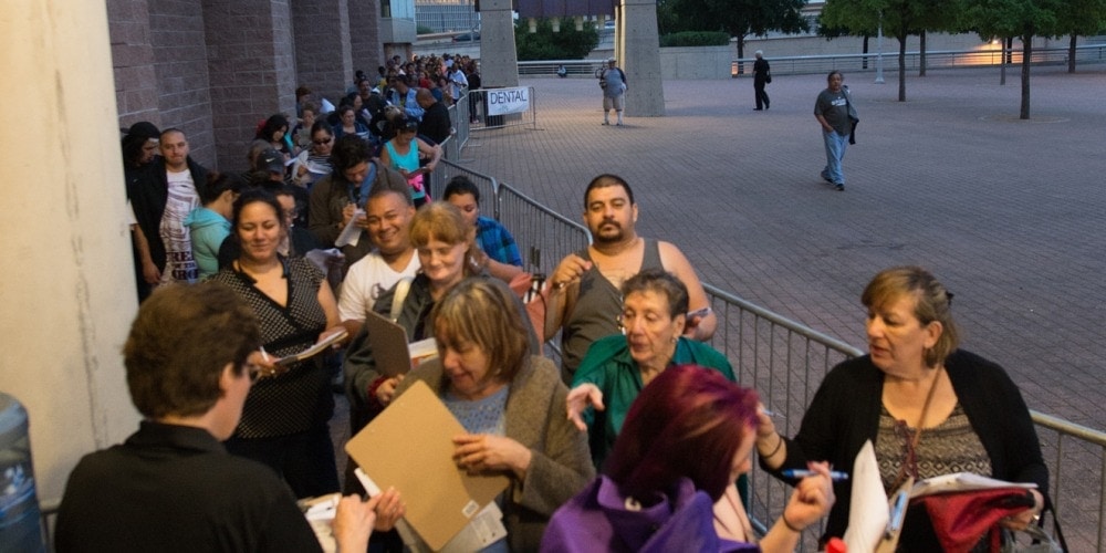 People waiting for free treatment at the Alamodome in San Antonio, Texas, on April 8. (James Bokovoy / NAD)