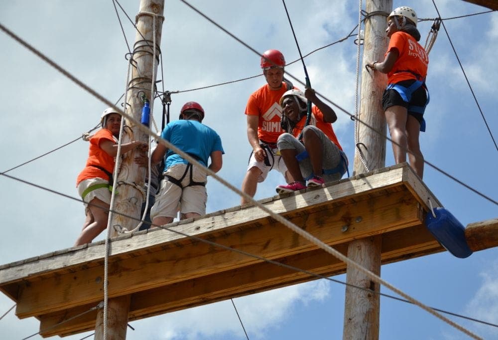Campers prepare to go ziplining at Camp Wagner in Michigan last summer.  (NAD)
