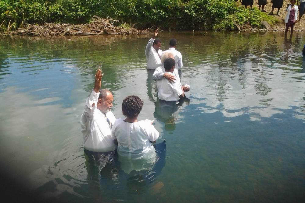 People being baptized after the evangelistic series in Fiji. (Adventist Record)