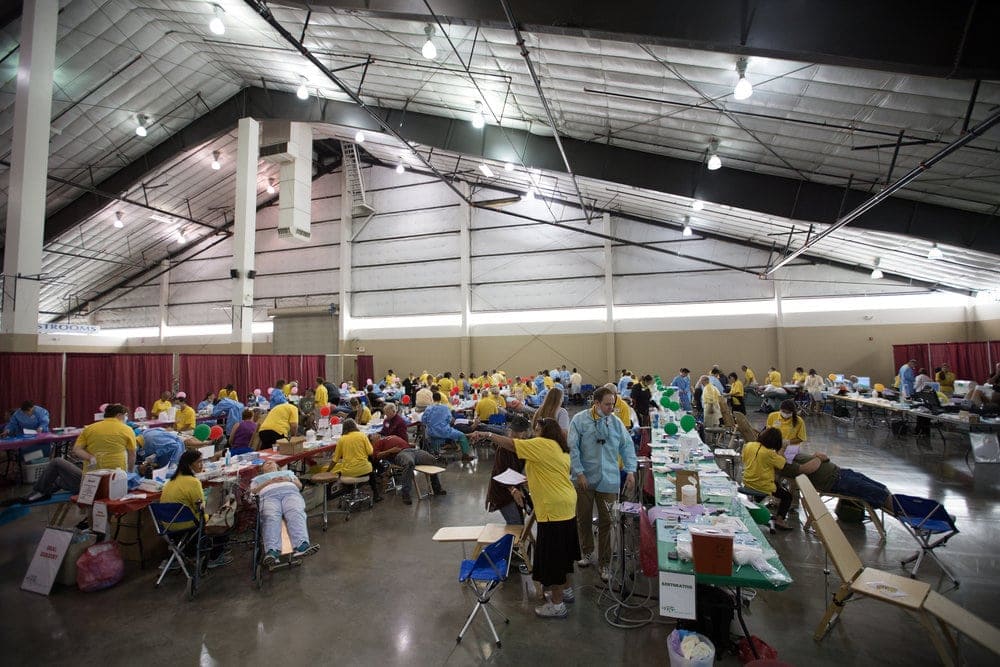 Dental patients being treated in the expo center at the Spokane County Fairgrounds on Aug. 3. (Anthony White / NPUC)