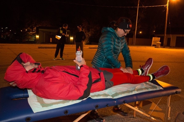 Glanz receives physical therapy at one of the checkpoints during the night.  Credit: (Photo by Darren Heslop)