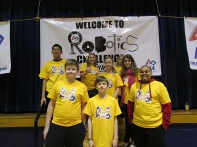 The Blue Mountain Elementary school team pose with their second-place trophy at the FIRST Lego League and Adventist Robotic League challenge. The seven member team won a place at the ARL national challenge.[Photo: CU Visitor]