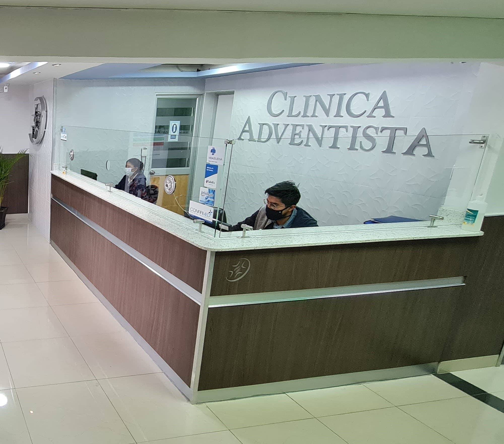 Team members at Quito Adventist Clinic in Ecuador, ready to see patients at the hospital. [Photo: AdventHealth Communications]