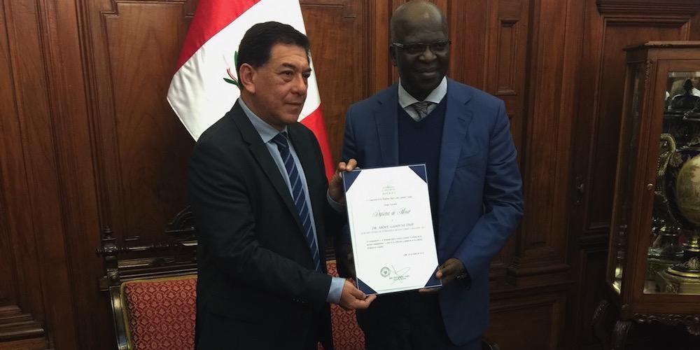 Public Affairs and Religious Liberty department director Ganoune Diop (right), being honored by the National Congress in Peru for his advocacy efforts on behalf of religious liberty and freedom of conscience. [Photo: Public Affairs and Religious Liberty]