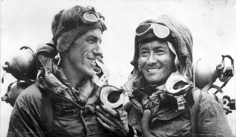 Edmund Hillary (left) and Tenzing Norway arrive in camp after reaching the summit of Mt. Everest.