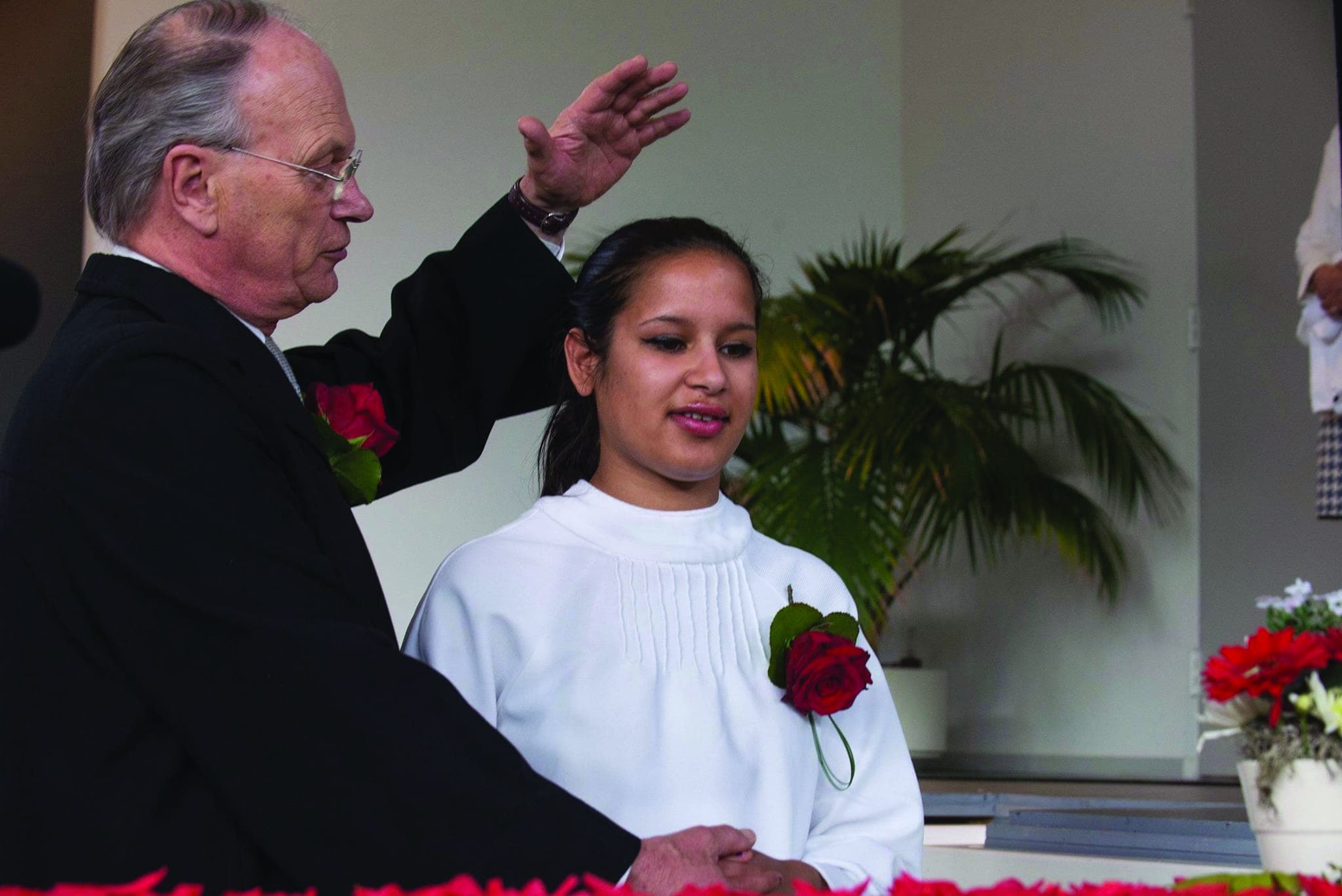 A young girl is baptized in the Netherlands, one of the more than 1.2 million people baptized into the Seventh-day Adventist Church around the world in 2016. [Netherlands Union]