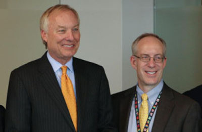 Peter Franchot, Maryland comptroller, thanks William "Bill" G. Robertson, outgoing president of Adventist HealthCare, for his contributions to Maryland. [Photo: AHC]