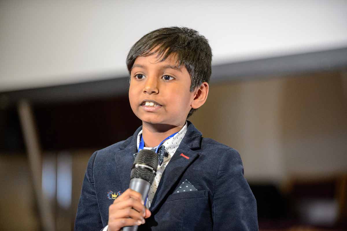 Eight-year-old Noah Gungadoo, the youngest presenter ever at a GAiN conference, shared ideas for using a drone for mission. [Photo: Tor Tjeransen/ADAMS]