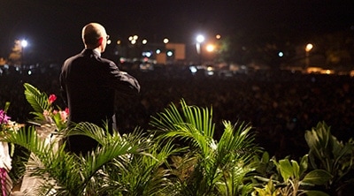 Pastor Wilson preaches to a crowd of 15,000 in Port Moresby. [Photo: SPD Record]