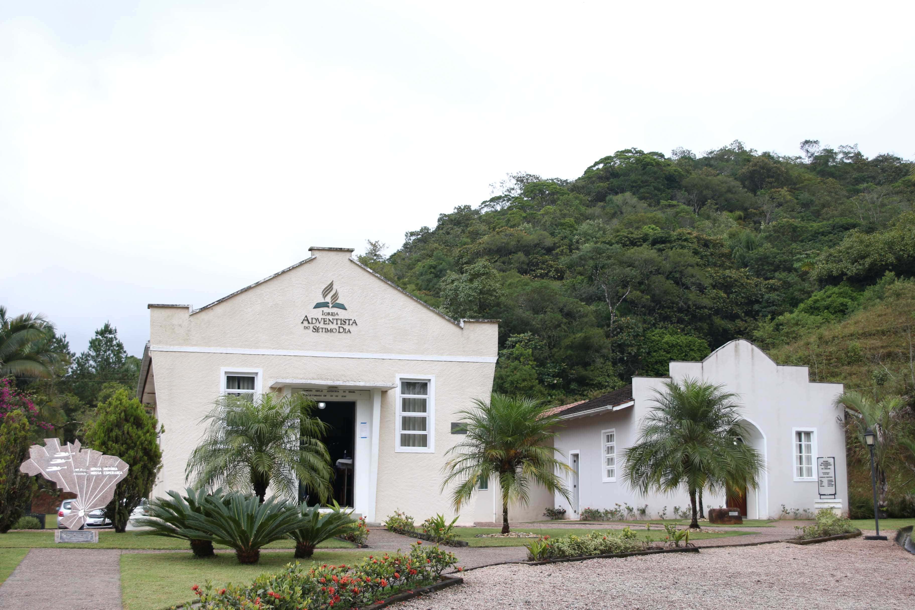 Gaspar Alto Seventh-day Adventist Church (left) in Santa Catarina, Brazil, next to the local museum. [Photo: South American Division News]