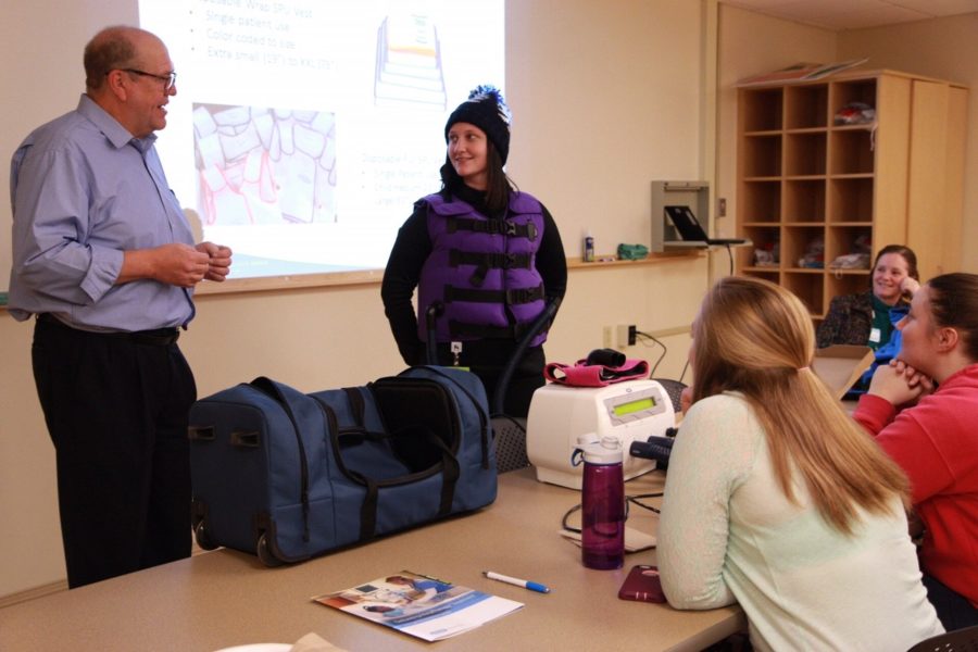 John Servick, an alumnus of Kettering College, came and did a demonstration of how the MetaNab device and vest works. [Photo: Kettering College]