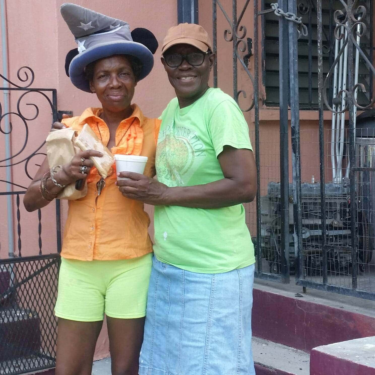 One of the leaders of the ministry to the homeless, right, with Desiree, one of the ladies the church is supporting in Fredericksted, US Virgin Islands. [Photo: North Caribbean Conference, Inter-American Division News]