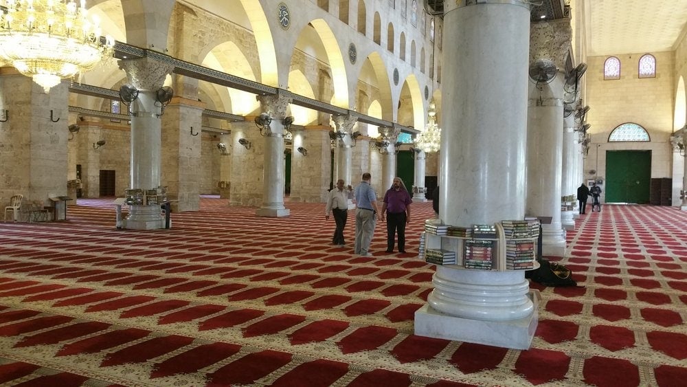 The Russians touring the Al-Aqsa Mosque, which usually is only open to Muslims.