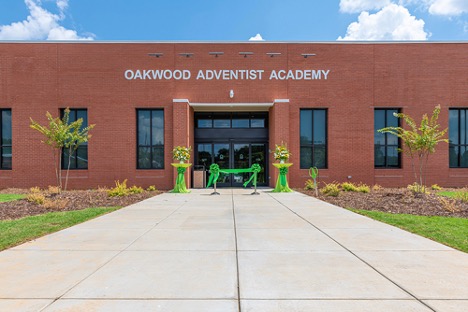 The inaugural event for the new Oakwood Adventist Academy (OAA) building was held at the school’s entrance on August 9, 2020. The third and final phase of the OAA multi-education complex project, the high school building, was recently completed. [Photo: Breath of Life]