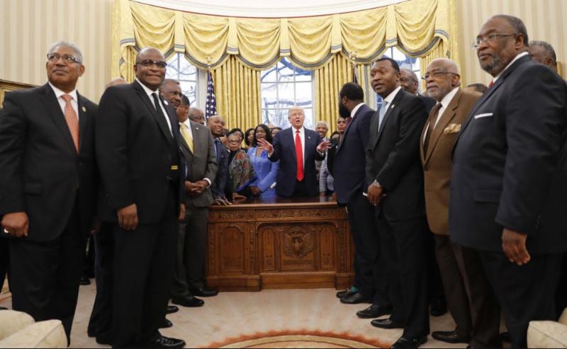 Les Pollard, Oakwood University president (second from left), in a meeting convened by President Trump at the White House in late February. [PHOTO: AP/Oakwood University]