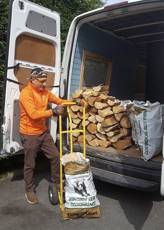 With the help of his van, Tony O’Rourke is delivering groceries, firewood, and other items to high-risk neighbors in western Ireland. [Photo: Irish Mission]