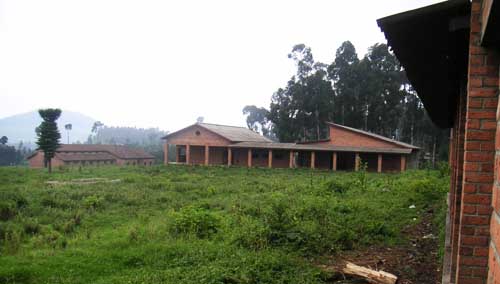 The abandoned campus in Mudende in 2004: the science building in the foreground and the men’s dormitory in the background.