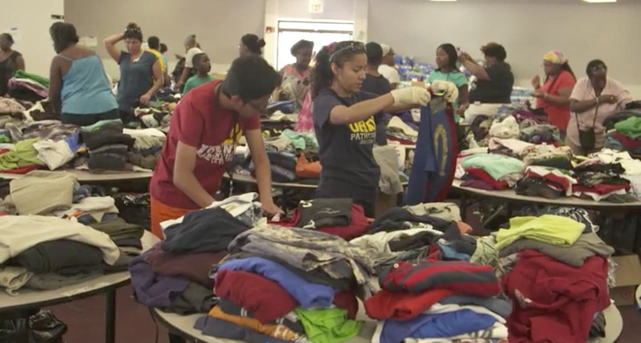World Harvest Outreach Church volunteers prepare clothing items to be distributed among the people affected by Hurricane Harvey in Houston, Texas. [North American Division News]