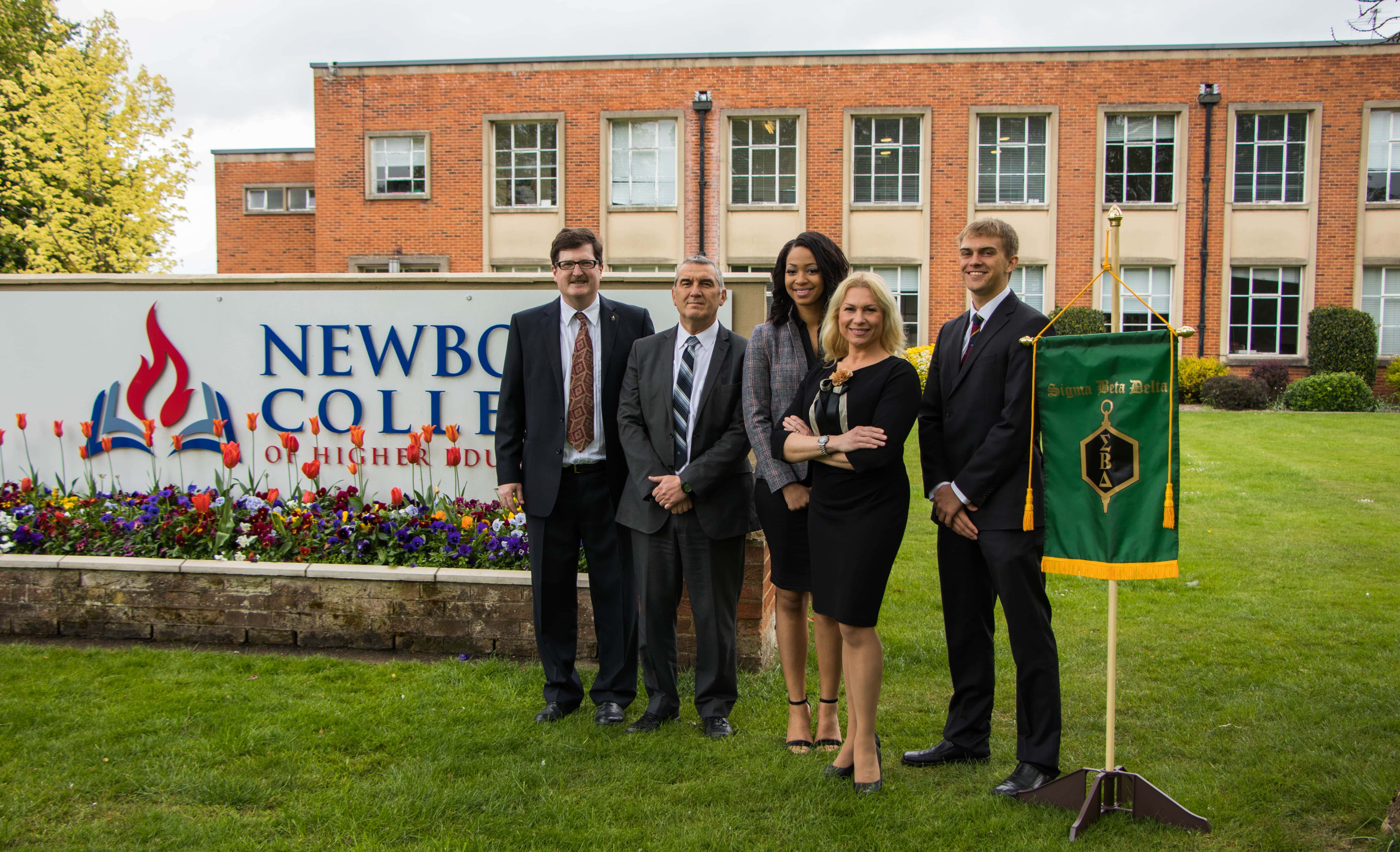 Two of the student inductees and their mentors, after the official induction ceremony on the campus of Newbold College, England, on April 28. [Photo: Newbold College]