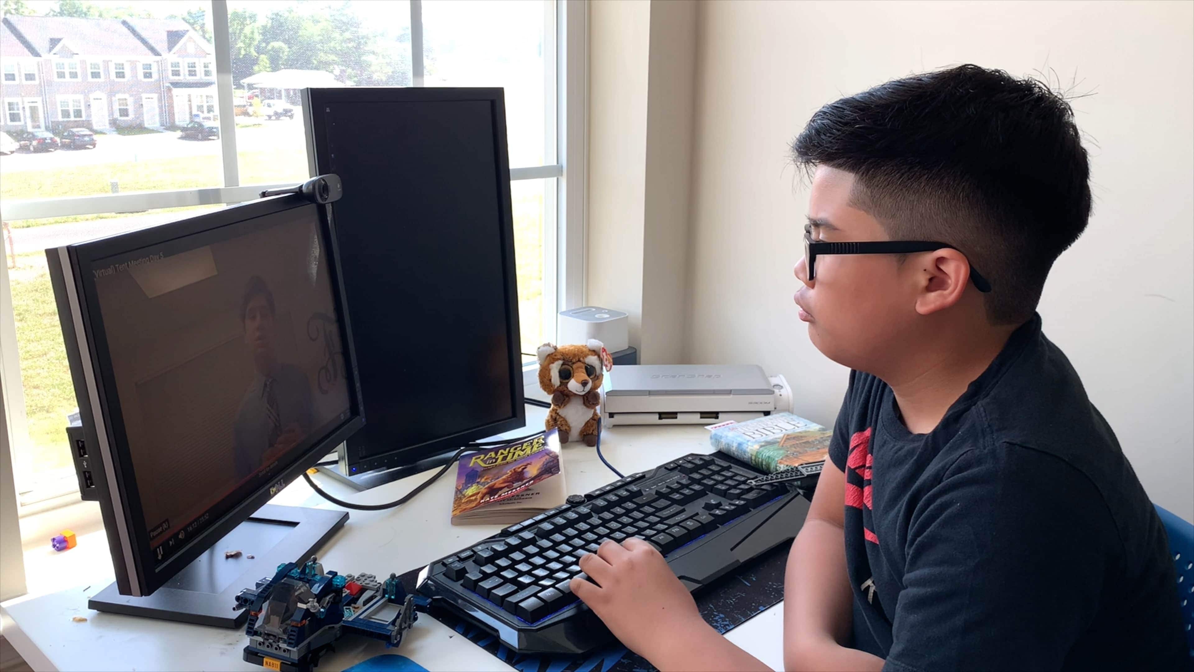 As “The Tent” evangelistic series led and run by Ruth Murdoch Elementary School students in Berrien Springs, Michigan, goes virtual, kids like this boy can watch online. [Photo: Mark B. Sigue, North American Division News]