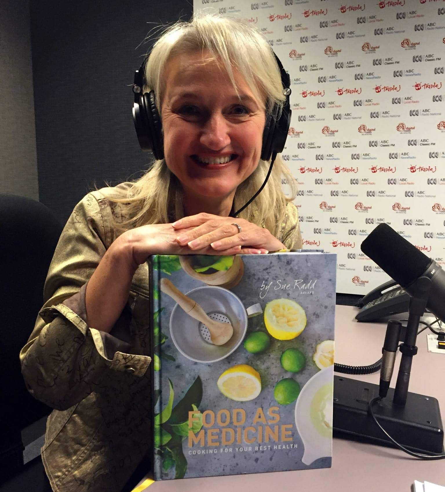 "Food As Medicine" cookbook author Sue Raad is shown during a radio appearance. The cookbook received a national award in Australia and qualified for an international competition. (Signs Publishing Company photo)