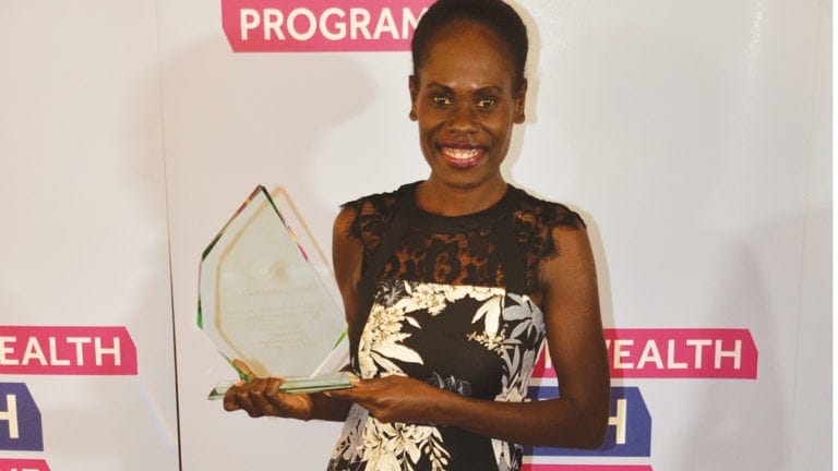 Jacqueline Joseph, CEO and co-founder of Equal Playing Field, with her award. [Photo: South Pacific Record]