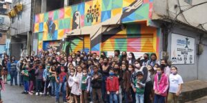 Adventists Share Color and Hope in Brazil’s Largest Slum
