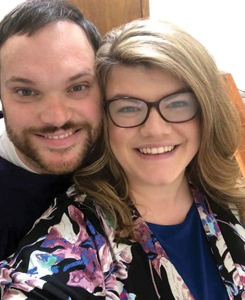 Rick and Laken Merrit snap a photo before Rick’s baptism in 2019, at the Laurel Seventh-day Adventist Church in Mississippi, United States. [Photo: Gulf States Conference] 