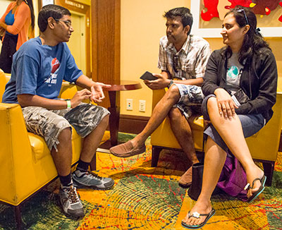 Left to right: Impact San Antonio delegates Alan Joseph, Anil Chander Dass, and Vandana Anil Dass talk about the July 6, 2015, morning worship. All three are from the Seventh-day Adventist Central English Church in Bangalore, India (Southern-Asia Division).