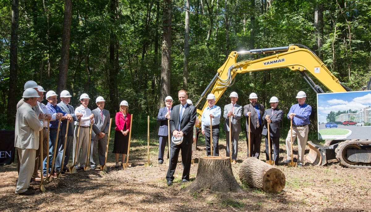 Guests at the groundbreaking ceremony for the new It Is Written headquarters in Collegedale, Tennessee, United States. Speaker/director John Bradshaw, center, gets ready to move some earth. [Photo: It Is Written]