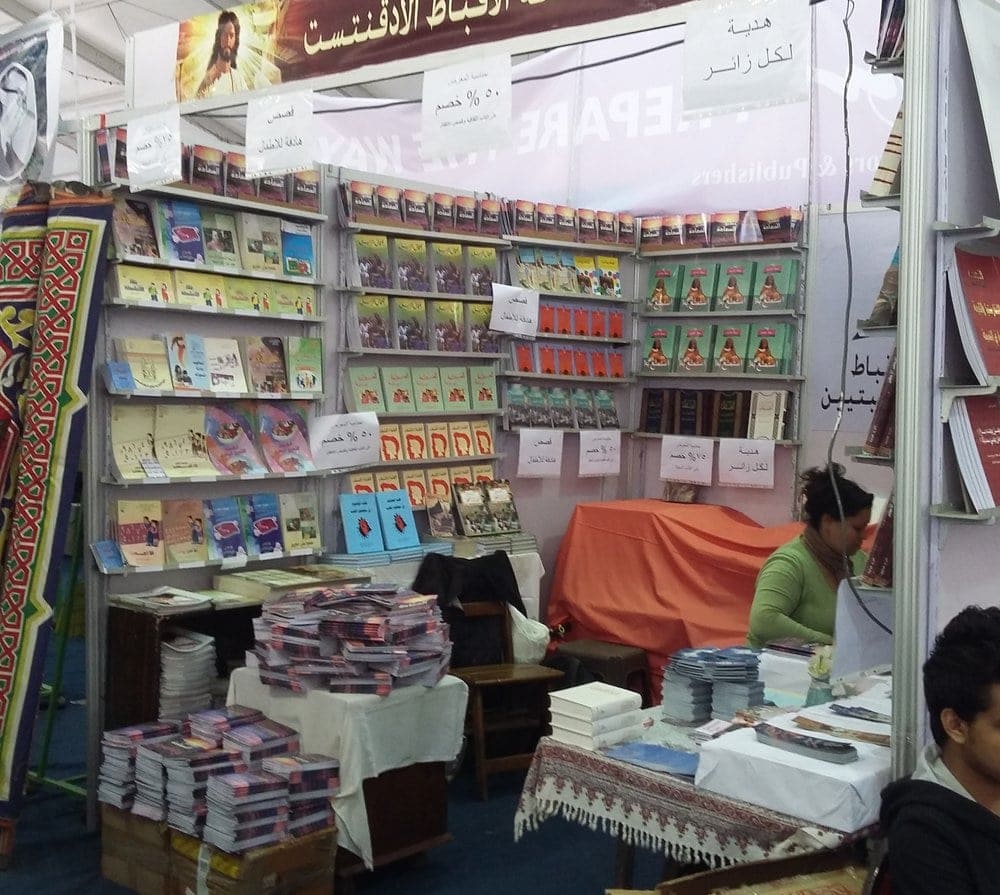 Ranya Maher manning the Adventist booth at the Cairo International Book Fair. Photo: Amgad Nageh