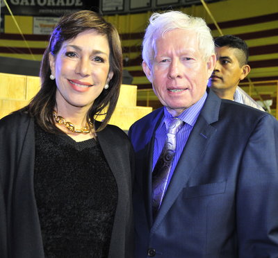 John Carter posing with Ana Vilma de Escobar, former vice president of El Salvador. Credit: The Carter Report