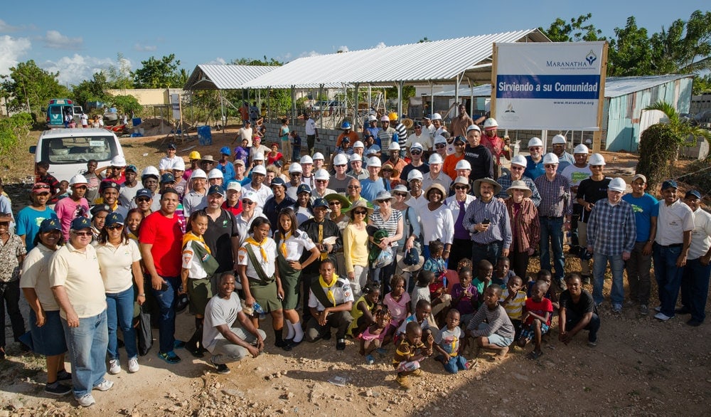 Church leaders, their spouses, and other volunteers posing at the church construction site. Photo: Tom Lloyd / Maranatha 