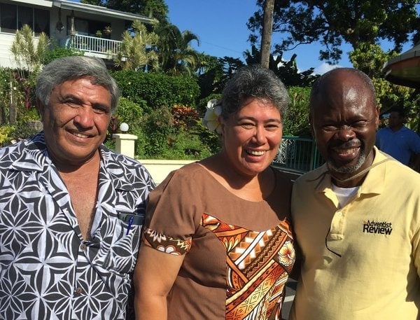 Caesar, right, visiting the grounds of the Samoas-Tokelau Mission compound with Owen Ryan and Ryan's wife, Anna. For AR