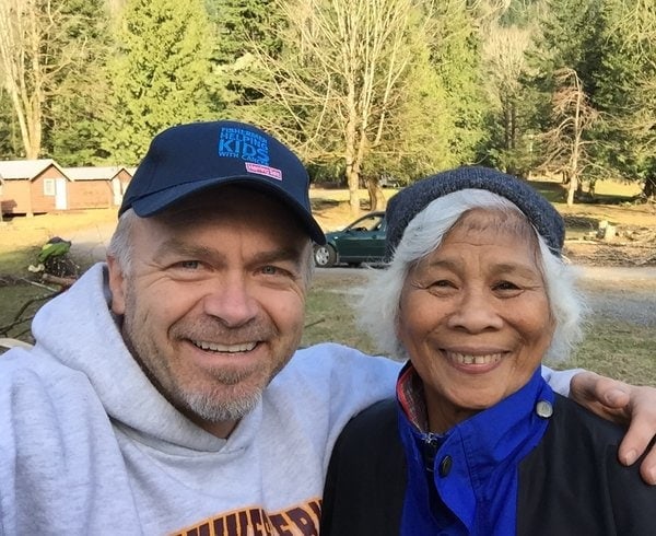Camp director Bill Gerber posing with 80-year-old volunteer Concepcion Sison at Camp Hope in British Columbia, Canada, on Sunday, Feb. 22.