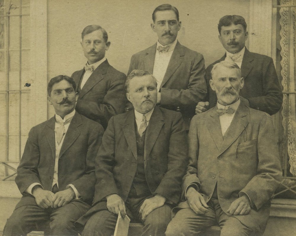 William A. Spicer, front center, posing with the first Indians to be ordained to gospel ministry while he lived in India from 1898 to 1901.